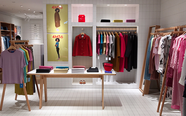 Store display with curated apparel.